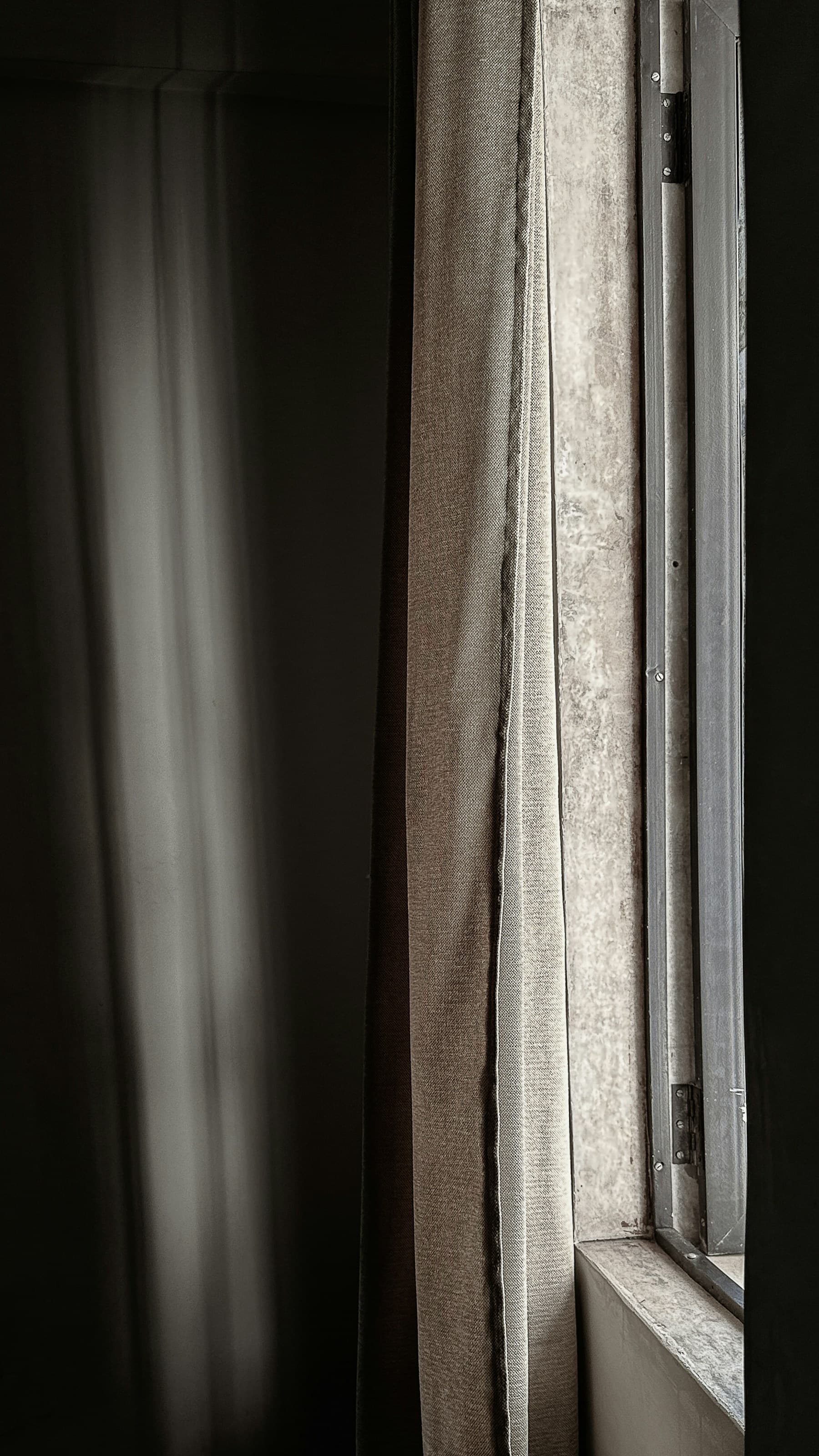 Natural light across linen and architectural detail